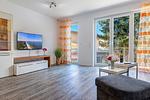 Wohnzimmer - Ferienhaus Ostseeparadies mit 2 Bädern und Terrasse - der Strand ist nur 800 Meter entfernt - Top-Hundeurlaub