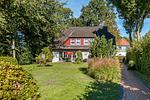 Ansicht des Ferienhauses mit Garten - Schwinkelsmoor - Top-Hundeurlaub