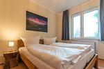 FB01_Haus Falkenhagen 11_Schlafzimmer 1 - Naturpur Ferienhaus - Top-Hundeurlaub