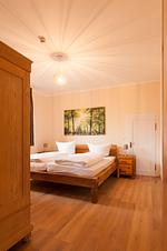 FB01_Haus Falkenhagen 11_Schlafzimmer 4 - Naturpur Ferienhaus - Top-Hundeurlaub