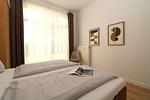 Schlafzimmer - Appartementhaus Meeresblick Fewo E.11 (rolli-freundlich) - Top-Hundeurlaub