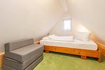 Schlafzimmer - Ferienwohnung Mü mit Kamin, große Küche und Sonnenterrasse - Top-Hundeurlaub