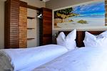 Schlafzimmer - Typ B1 Ferienhaus - Pukalani - Top-Hundeurlaub
