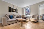 Wohnzimmer - Ferienwohnung Stadtperle Gold Westerland auf Sylt - Top-Hundeurlaub