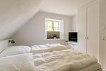 Schlafzimmer - Doppelhaushälfte Küstenruhe 1 - Top-Hundeurlaub