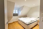 Schlafzimmer - Doppelhaushälfte Küstenruhe 1 - Top-Hundeurlaub