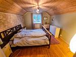 Gemütliches Schlafzimmer mit Dachschräge in der Villa Clara – Ferienhaus in Småland nahe der Ostsee bei Blankaholm - Villa Clara - Top-Hundeurlaub