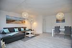 Wohnzimmer mit Blick in den Wohn- und Essbereich - Wohnung 115 - Top-Hundeurlaub