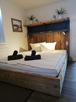 Schlafzimmer - Hafenloft Apartment 1 - Top-Hundeurlaub