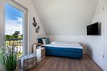 Schlafzimmer - Ferienhaus 1 (Beach House) - Top-Hundeurlaub