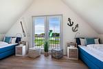 Schlafzimmer - Ferienhaus 1 (Beach House) - Top-Hundeurlaub