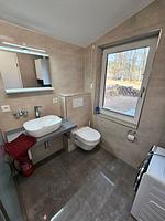 Blick aus dem Badezimmer auf die Terrasse - Ferienhaus Kammblick - Top-Hundeurlaub