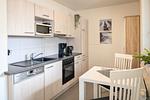 offene Küche mit Essecke - Wohnung 04 - Top-Hundeurlaub