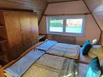 Schlafzimmer - Schwanensee Ferienhaus - Top-Hundeurlaub