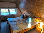 Schlafzimmer - Schwanensee Ferienhaus - Top-Hundeurlaub