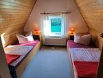 Schlafzimmer - Schwanensee Ferienhaus - Top-Hundeurlaub