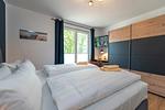 Schlafzimmer - Ferienwohnung Haffhafen - Top-Hundeurlaub