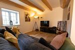 Wohnzimmer - Ferienhaus Bauernkate Basstölpel - Top-Hundeurlaub