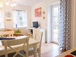 Esstisch in der Ferienwohnung Hopelfask in Süddorf auf Amrum - Ferienwohnung *Hopelfask* - Top-Hundeurlaub