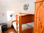 Schlafzimmer mit Stockbett in der Ferienwohnung Hopelfask in Süddorf auf Amrum - Ferienwohnung *Hopelfask* - Top-Hundeurlaub