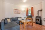Wohnzimmer - Ferienhaus See Idyll 2 mit Kamin, Terrasse und 2 Bädern - Top-Hundeurlaub