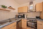 Küche / Küchenzeile - Ferienhaus See Idyll 2 mit Kamin, Terrasse und 2 Bädern - Top-Hundeurlaub
