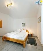 Schlafzimmer - Ferienwohnung 14 - Top-Hundeurlaub