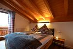 Schlafzimmer 1 - Waldhirsch - Feriendorf Via Claudia Haus 90 - Top-Hundeurlaub
