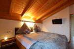 Schlafzimmer 1 - Waldhirsch - Feriendorf Via Claudia Haus 90 - Top-Hundeurlaub