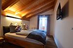 Schlafzimmer 2 - Waldhirsch - Feriendorf Via Claudia Haus 90 - Top-Hundeurlaub