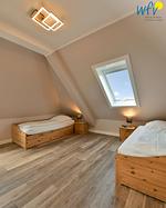 Schlafzimmer - Ferienwohnung Strandläufer - Top-Hundeurlaub