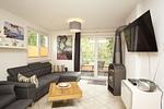 Wohnzimmer - FeWo 03: Balkon, Gartennutzung, Saunanutzung - Top-Hundeurlaub