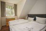 Schlafzimmer - FeWo 04: Balkon, Gartennutzung, Saunanutzung - Top-Hundeurlaub