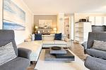 Wohnzimmer mit Sessel - Reethaus 18a - Top-Hundeurlaub