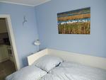 Schlafzimmer mit Ausziehbarem Bett - Kavelweg 13 Wohnung 1 - Strandrefugium - Top-Hundeurlaub