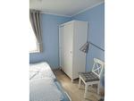 Schlafzimmer mit Ausziehbarem Bett - Kavelweg 13 Wohnung 1 - Strandrefugium - Top-Hundeurlaub