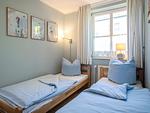 Schlafzimmer mit zwei Einzelbetten - Birkenstrasse 6i Wohnung 14 - Top-Hundeurlaub