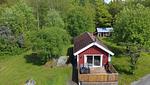 Terrasse mit Sitzgelegenheiten am Hus Rusken - Hus Rusken - Top-Hundeurlaub