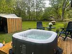 Whirlpool und Sitzbereich im gepflegten Garten - Hus Rusken - Top-Hundeurlaub