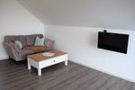 Wohnzimmer - Haus Nr. 25, Ferienhaus Fischerhus - Top-Hundeurlaub