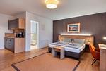 Wohnzimmer - Ferienwohnung Graureiher 18 im Wreecher Idyll Rügen - Top-Hundeurlaub