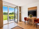 Wohnzimmer - Ferienwohnung Graureiher 18 im Wreecher Idyll Rügen - Top-Hundeurlaub