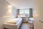Schlafzimmer - Haus Weissenburg Whg. Garten Ost - Top-Hundeurlaub