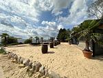 Entspannen Sie am traumhaften Sandstrand unter Palmen in der Lykke Bar - Findus - Top-Hundeurlaub