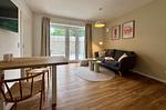 Gemütliches Wohnzimmer ideal für entspannende Abende. - Salt & Sand Wohnung Sand - Top-Hundeurlaub