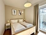 Gemütliches Schlafzimmer ideal für erholsame Nächte. - Salt & Sand Wohnung Sand - Top-Hundeurlaub