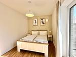 Gemütliches Schlafzimmer ideal für erholsame Nächte. - Salt & Sand Wohnung Sand - Top-Hundeurlaub