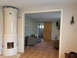 Wohnzimmer mit Kachelofen im Ferienhaus Villa Luis in Ruda Småland - Villa Luis - Top-Hundeurlaub