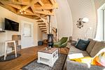 Ferienhaus Tamika am Tollensesee - Wohnbereich mit Kamin - Tamika - Top-Hundeurlaub