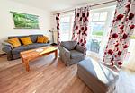 Wohnzimmer - Strandresidenz Juliusruh Fewo 10 - Balkon, 2 SZ - Top-Hundeurlaub